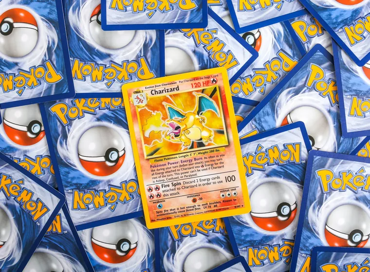 Sealed trading card booster packs laid out in a grid