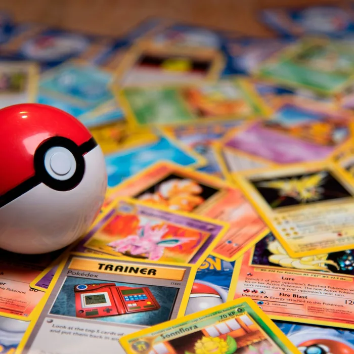 Vaporeon card beside its certification label