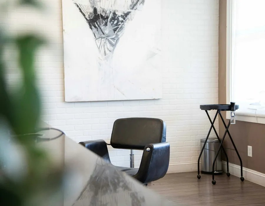Styling station detail with mirror and chair