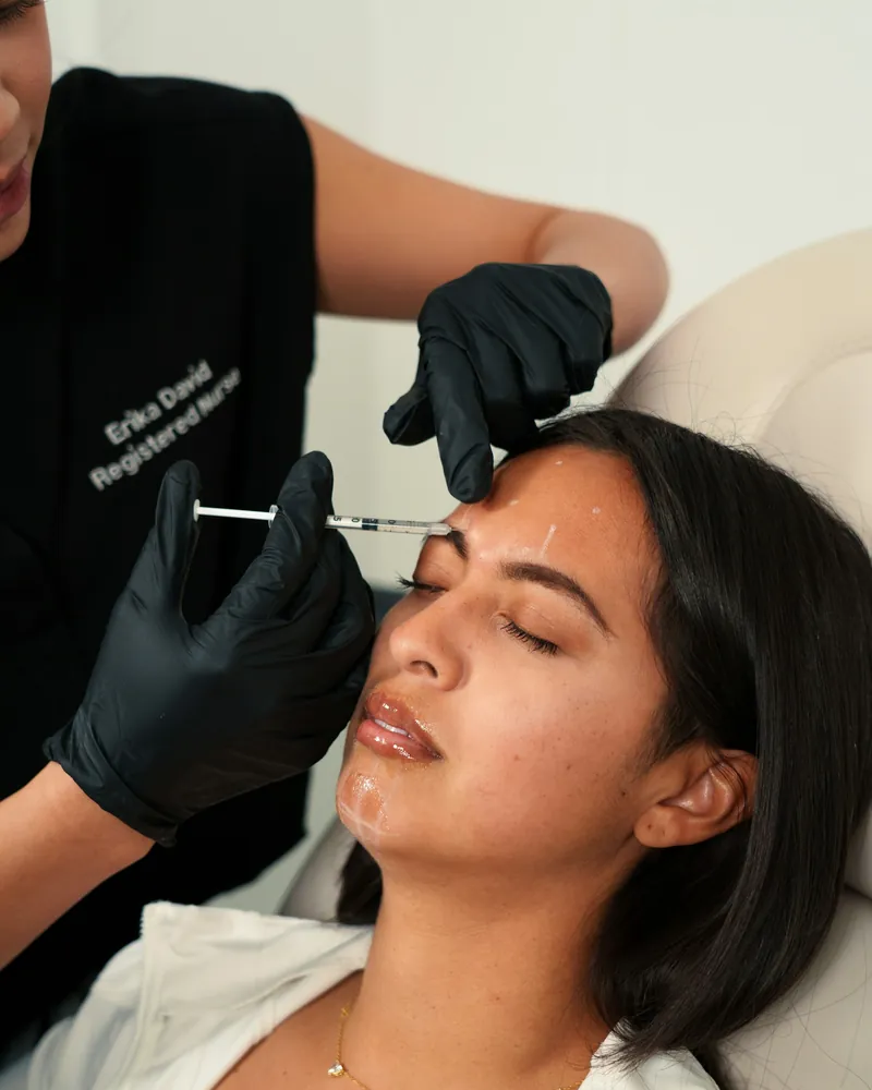 Client reclining during a facial contouring consultation