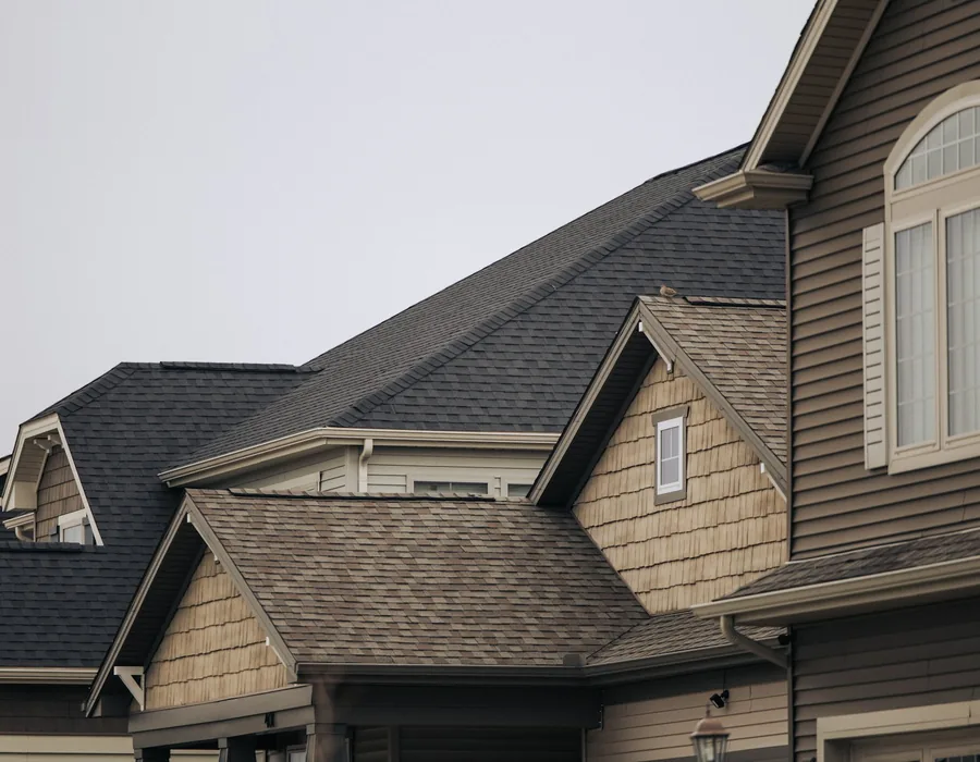 Multi-gable residential roof with fresh architectural shingles