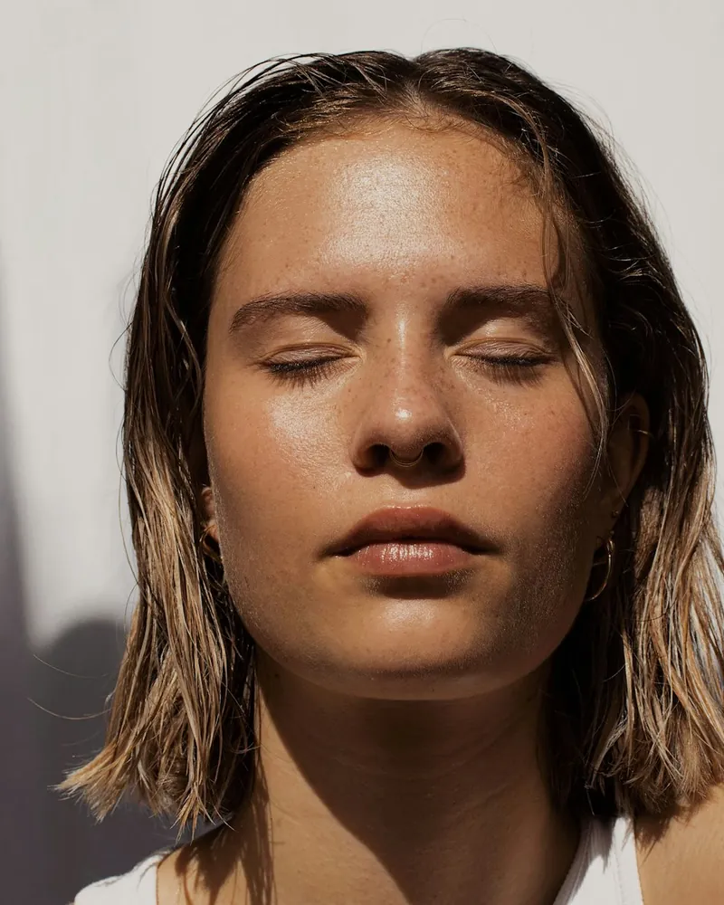 Portrait of a person in natural light with bare skin