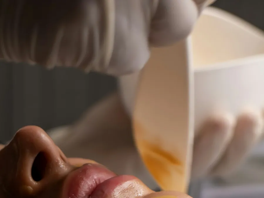 Warm mask being applied during a facial treatment